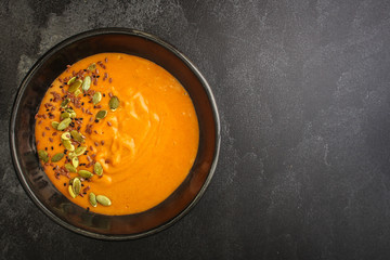 pumpkin soup (first course, delicious vegetable vitamin food) menu concept. food background. copy...