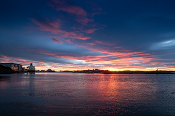 Naklejka premium Coastal ships arrives Bronnoysund harbor in Northern Norway