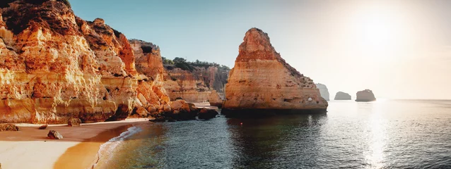 Papier Peint photo Plage de Marinha, Algarve, Portugal One of the must visit spot at the famous coastline with rocks and beautiful beaches at sunset light Praia da Marinha, Famous Beach, Algarve Coast, Lagoa, Portimao in South Portugal, Atlantic Ocean