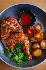 grilled chicken with baby potatoes and tomato sauce