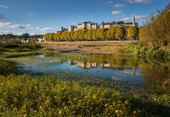 Fototapeta premium Reflection of Forteresse Royale de Chinon in the Vienne River, Chinon, France.