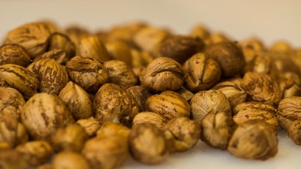 Right Hazelnuts kernels in the background.