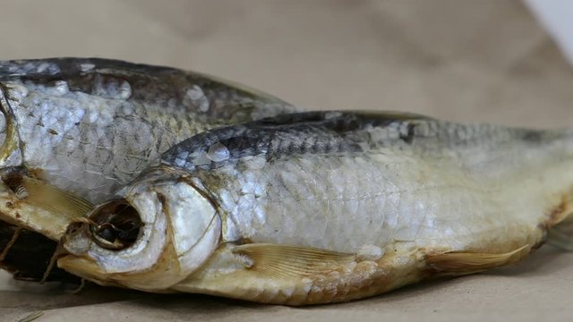 Dried Salt Fish Kraft Paper Background Panning Slider Shot.