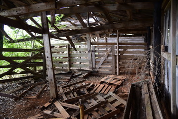 Fototapeta na wymiar Old Barn with broken wood