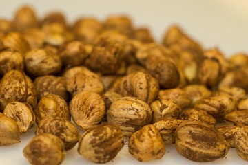 Right Hazelnuts kernels in the background.