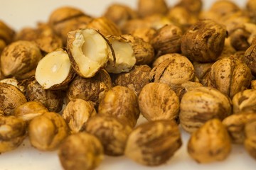 Right Hazelnuts kernels in the background.