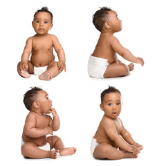 Cute little baby crawling on white background