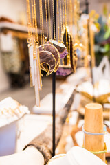 Necklaces hanging in a jewelry store