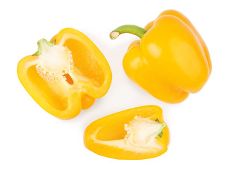 Fototapeta na wymiar Whole and cut yellow bell peppers isolated on white, top view