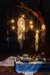  Wedding decor in the style of a boho dreamcatcher in the night light. Visiting ceremony, concept
