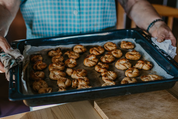 woman making traditional Christmas sweets and desserts