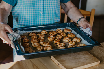 woman making traditional Christmas sweets and desserts