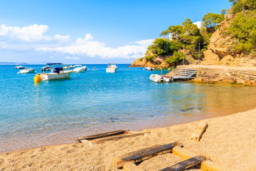 Stunning beach with azure sea water in beautiful Sa Riera village, Costa Brava, Catalonia, Spain