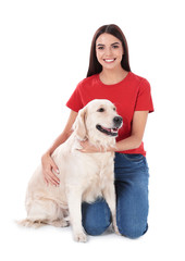 Young woman and her Golden Retriever dog on white background