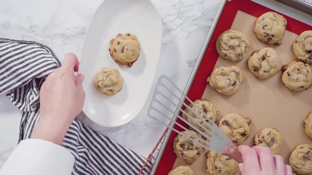 Time lapse. Step by step. Flat lay. Freshly baked homemade soft chocolate chip cookies on a baking sheet.