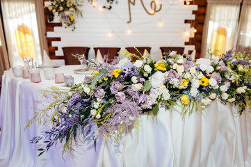 Luxurious wedding presidium in white with silver elements.