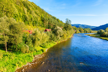 View of Dunajec river and green landscape near Nowy Sacz, Poland