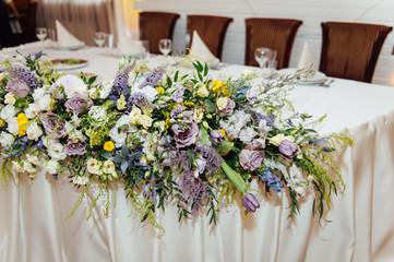 Luxurious wedding presidium in white with silver elements.