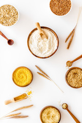 Healthy food concept. Cereals in bowls on white background top view