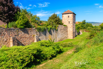 Fototapeta na wymiar Old tower in Kientzheim village on Alsatian Wine Route, France