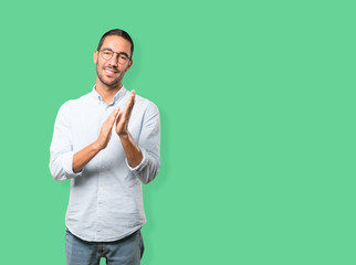Kind young man applauding