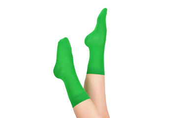 Woman in green socks isolated on white background. Top view.