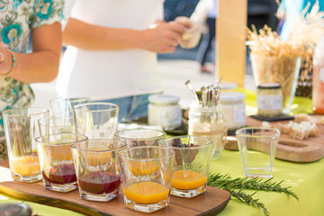 Preparing delicious finger food at outdoor market place.