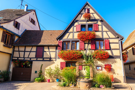 Old typical French house in Beblenheim village on Alsatian Wine Route, France