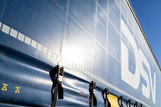 CUXHAVEN, GERMANY - November 6, 2017: DSV curtain side trailer. DSV A/S is a Danish transport and logistics company offering transport services worldwide by road, air, sea and train.