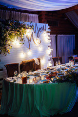 Luxurious wedding presidium in white with silver elements.