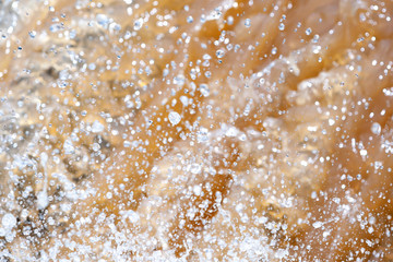 Close-up shot of splashing waterfall.
