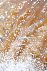 Close-up shot of splashing waterfall.