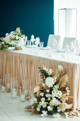 Luxurious wedding presidium in white with silver elements.