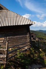 Fototapeta na wymiar Wooden sheds in the Ukrainian Carpathians