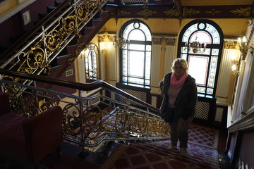 Bydgoszcz, Poland - September 2019: Interior of the lobby of an ancient hotel. Stairs in the hotel...