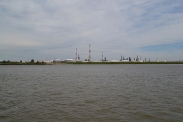 Fototapeta na wymiar Power plant on the shore of Scheldt river, in Anvers, Belgium, Europe 