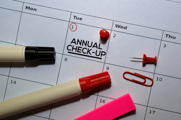 Annual Check-up text on white calendar background. Reminder or schedule concept