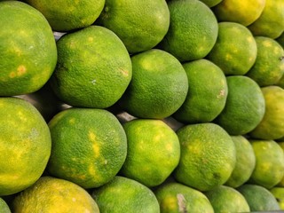 fresh green limes in the market
