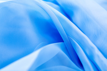 blue satin fabric texture for the background.