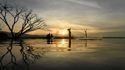 Fisherman Family and amazing sunrise .