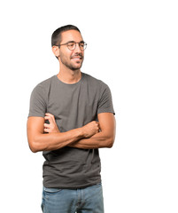 Friendly young man doing a gesture of confidence