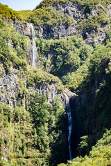 Fototapeta na wymiar Huge waterfall in the middle of a levada - Madeira, Portugal
