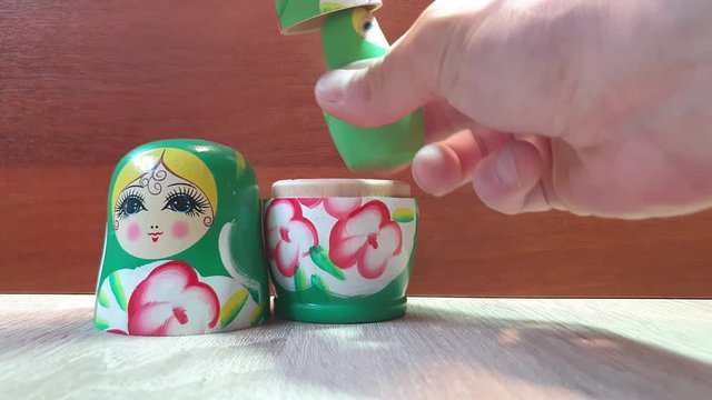 Wooden nesting dolls in the close-up. Russian nesting dolls.