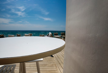 White wooden table of free space for your decoration and summer bar in resort. 