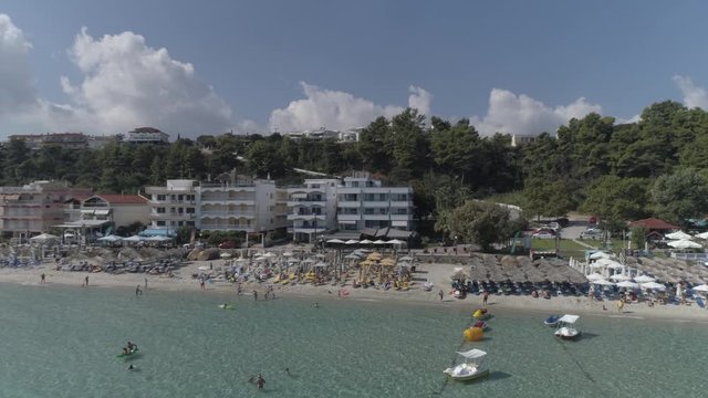 Aerial view of Kallithea village. During the summer, Kallithea is the most popular village in Halkidiki, Greece. 4K