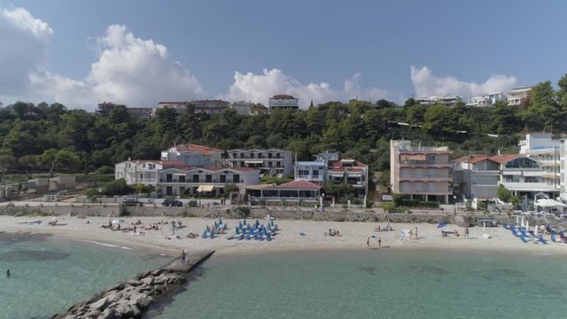 Aerial view of Kallithea village. During the summer, Kallithea is the most popular village in Halkidiki, Greece. 4K