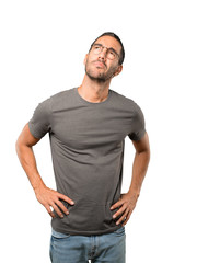 Fototapeta premium Hesitant young man looking gesture