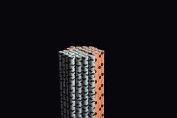 Stack of white and yellow paper straws