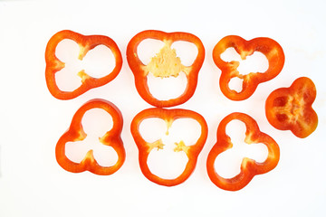 Sliced ​​pepper on a white background