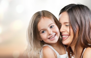 Happy Mother and daughter hugging